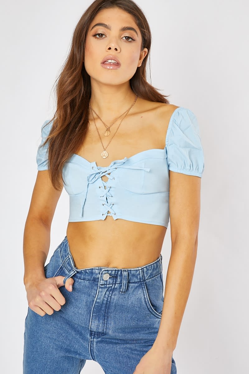 blue lace up front puff sleeve crop top